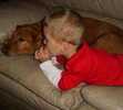 Reba watching TV with her boy