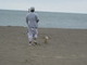 daddy & chewy walking on the beach