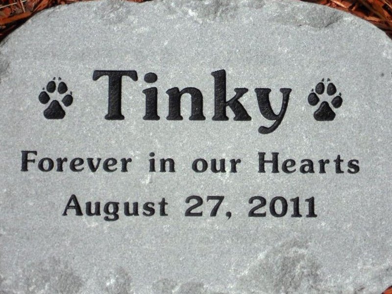 Tinky's grave stone at our house in Pembroke Falls.