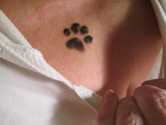 An imprint of your pawprint above my heart...