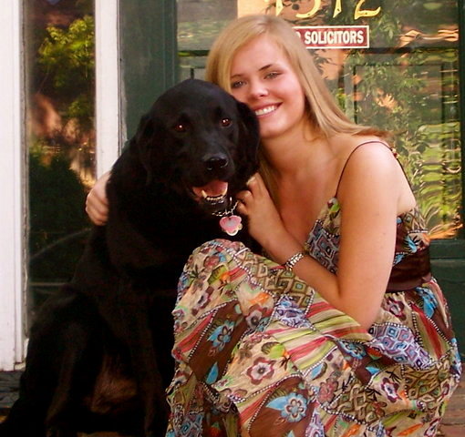 Posing with one of his owners, Erin, on her H.S. graduation day